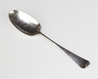 A Georgian silver shell back dessert spoon, possibly Nicholas Hearnden 50 grams