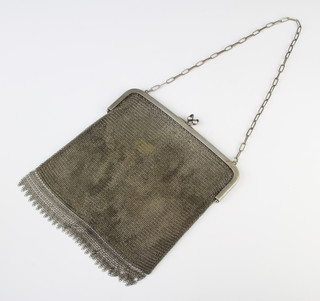 An Alpaca mesh purse with cabochon finials 