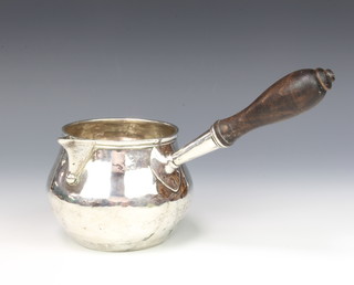 A 19th Century silver brandy saucepan with turned wood handle 24cm 