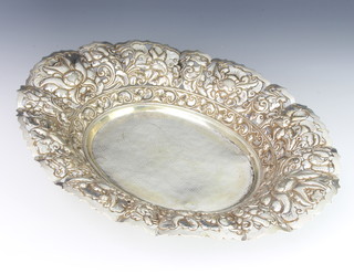 A Continental 800 standard repousse oval bowl with floral decoration 474 grams 36cm 
