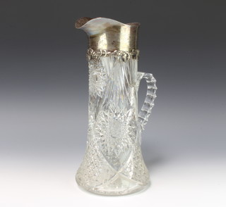 A cut glass lemonade jug with cast vinous sterling silver mount 36cm 