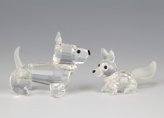 A Swarovski Crystal fox (mini) prowling 014956/7677055000 1988 by Adi Stocker 4cm, do. terrier 158416/7619000002 1990 by Adi Stocker 4cm boxed