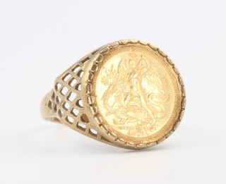 A 9ct yellow gold signet ring set with a 1/20th oz gold coin, gross 3.86 grams 