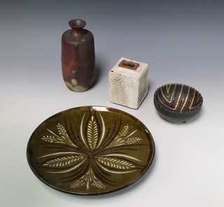 A Studio Pottery slip glazed dish by Gill Pryke 26cm. a do. bowl 12cm, a square vase 10cm and a cylindrical do. 19cm 
