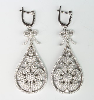 A pair of silver paste drop pear shaped earrings