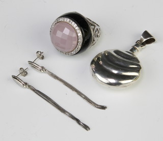 A silver paste set dress ring size K, a pair of earrings and a pendant 