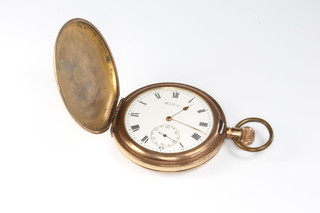 A gold plated hunter pocket watch, the dial inscribed Waltham with seconds at 6 o'clock 