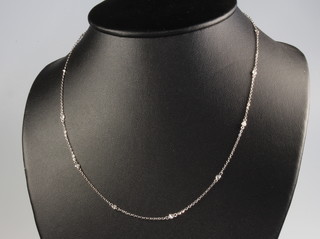 An 18ct white gold diamond set necklace 0.65ct, 44cm 