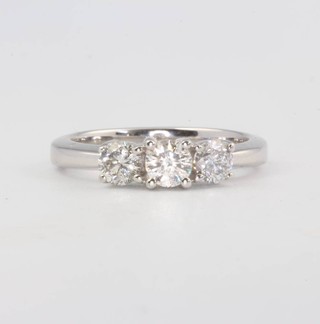 A 14ct white gold 3 stone diamond ring, 1ct, size M 1/2