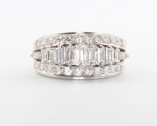 A white gold diamond dress ring set with baguette and brilliant cut stones approx. 2ct, size M 