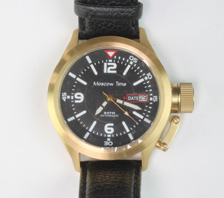A gentleman's gilt cased Moscow Time automatic calendar wristwatch on a leather bracelet, boxed 
