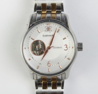 A gentleman's steel cased Earnshaw automatic wristwatch with visible movement on a bi-metallic bracelet, boxed