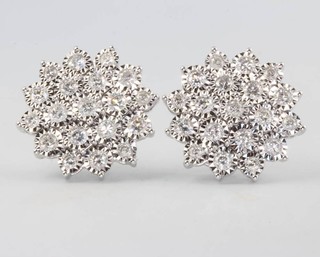 A pair of 18ct white gold illusion set diamond cluster ear studs, 2ct 