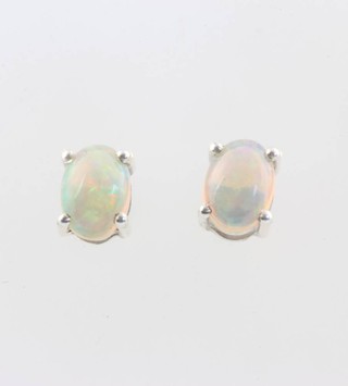 A pair of silver and Ethiopian opal ear studs approx. 1.5ct 