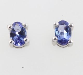 A pair of silver and oval tanzanite ear studs approx. 1.2ct 