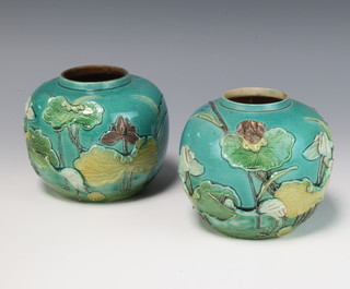 A pair of Chinese turquoise glazed ginger jars decorated with flowers 12cm 