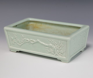 A Chinese Celadon shallow jardiniere decorated with flowering peony with impressed mark to base 23cm 