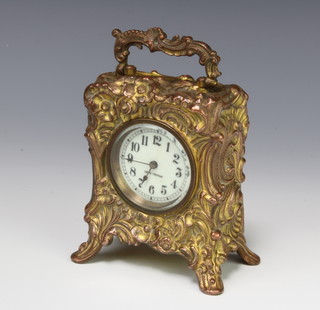 Seth Thomas, a 19th Century bedroom timepiece with enamelled dial and  Arabic numerals contained in a cast gilt metal case 