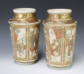 A pair of early 20th Century Japanese Satsuma tapered vases with panels of figures at pursuits 28cm 