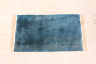 A blue ground Chinese rug 153cm x 93cm 