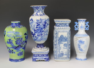 A modern Chinese green glazed oviform vase decorated with flowers and 3 early 20th Century  blue and white vases