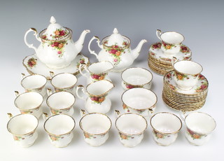 A Royal Albert Old Country Roses tea set comprising 12 tea cups, 12 saucers, 12 tea plates, 2 sandwich plates, 2 tea pots, 2 milk jugs, 2 sugar bowls 