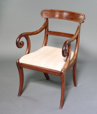 A Georgian mahogany bar back desk/carver chair with plain mid rail and upholstered drop in seat raised on sabre supports 