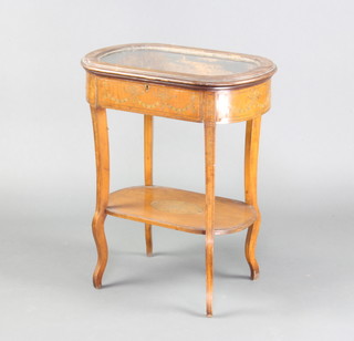 An Edwardian oval satinwood Sheraton Revival bijouterie table with undertier, the apron inlaid swags, raised on cabriole supports 65cm h x 54cm x 34cm
