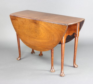 A Georgian oval mahogany drop flap pad foot tea table raised on club supports 70cm h x 105cm  x 40cm when closed x 125cm when open 