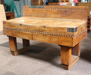 An Art Deco butcher's block with raised back, knife slot, the base fitted 2 long frieze drawers, raised on square tapered legs 117cm h x 178cm w x 75cm d 