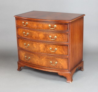 A Georgian style mahogany bow front chest with crossbanded top fitted 4 long drawers with brass swan neck drop handles, raised on ogee bracket feet 81cm h x 86cm w x 55cm d 