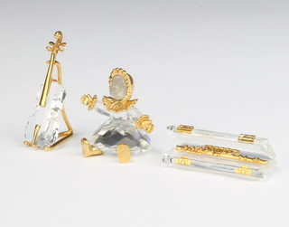 A Swarovski Crystal Memories  baby, oboe and double bass boxed