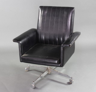 A 1960's chrome and black leather revolving office chair