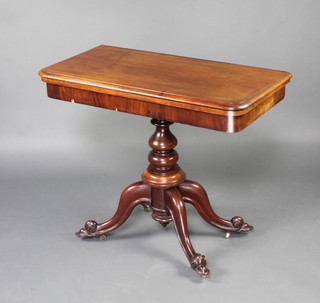 A Victorian D shaped mahogany tea table, raised on a turned column and tripod base 78cm x 95cm x 47cm 