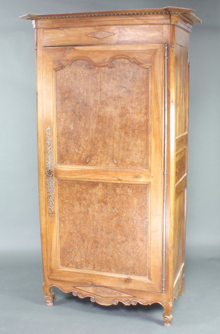 An 18th/19th Century French fruitwood armoire with moulded cornice enclosed by panelled door 224cm h x 130cm w x 80cm d 