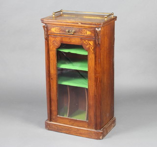 A Victorian inlaid walnut music cabinet with brass railed gallery fitted a drawer and a cupboard enclosed by a glazed panelled door 94cm h x 51cm w x 33cm d 