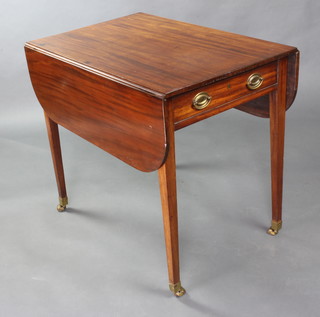 A Georgian mahogany Pembroke table fitted a drawer raised on square tapered supports ending in brass caps and castors 72cm h x 83cm w x 55cm when closed x 110cm when open  