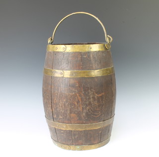 An oak and brass coopered barrel stick stand 40cm h x 25cm diam.  