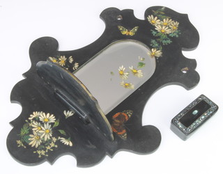 A Victorian black lacquered and mother of pearl decorated snuff box with hinged lid 2cm x 6cm x 3cm together with a black papier mache and floral decorated wall bracket with folding shelf set an arched plate bevelled plate mirror 33cm x 24cm 