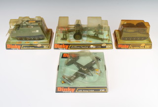 A Dinky Toys 353 Shadow 2 model, boxed (box damaged), a Dinky 609 Howitzer with gun crew boxed, a Dinky 690 Scorpion tank boxed and a Dinky 712 US Army T42A boxed 