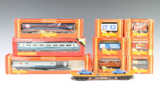 A Hornby R16 operating mail coach,  a Hornby R439 BR coach, do. R236 Gulf tanker and 6 other items of Hornby rolling stock boxed and a car transporter 