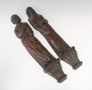 A Victorian carved oak panel decorated St Peter and 1 other decorated St Paul 60cm x 11cm x 3cm 
