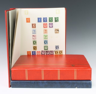 A Stanley Gibbons album of George VI to Elizabeth II GB mint stamps, an orange stock book of GB stamps, a George V to Elizabeth II used GB stamps, a blue stock book of Victorian to Elizabeth II used GB stamps 