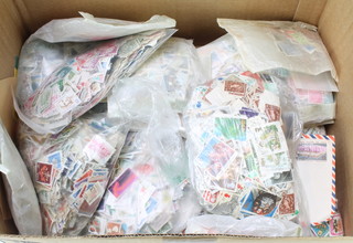 A box of loose world stamps