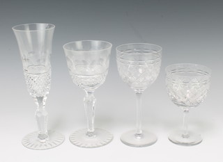 A set of 8 cut crystal glass champagne flutes and 8 matching wine glasses, 6 wine glasses and 6 matching hock glasses