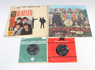 Parlophone Records, a collection of 6 Beatles Parlophone 45rpm records including I Want to Hold Your Hand, Ticket to Ride, Help, She's a Woman, Strawberry Fields Forever, Eleanor Rigby and 2 Paul McCartney ditto - Waterfalls and Coming Up, an Apple 45rpm John Lennon Working Class Hero, a Parlophone 45rpm Slade Thanks for the Memory (Wham Bam, Thank You Mam) and 2 Beatles LP's - Help and Sargent Peppers Lonely Heart Club Band  
