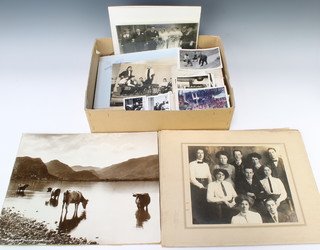 A small collection of first day covers, presentation stamps and a collection of Victorian and later wedding and portrait photographs 