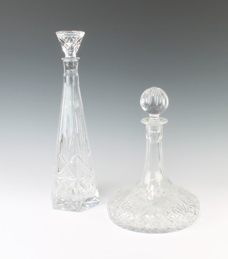 A hexagonal glass decanter and stopper 38cm and a ships decanter 27cm