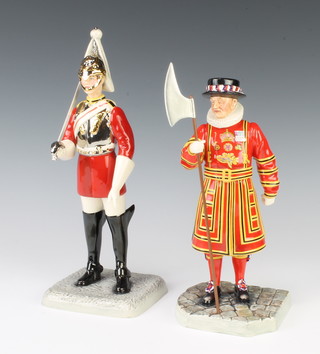 A Royal Doulton figure - Life Guard HN5364 27cm and a do. Beefeater HN5362 24 cm, boxed