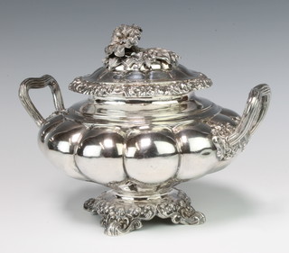 A 19th Century French silver 2 handled sugar bowl with floral finial and lobed body, 630 grams 